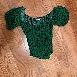 Reformation green top with cross bust, puff sleeves and smocking in back